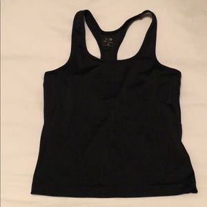 Black exercise shirt, built-in bra.